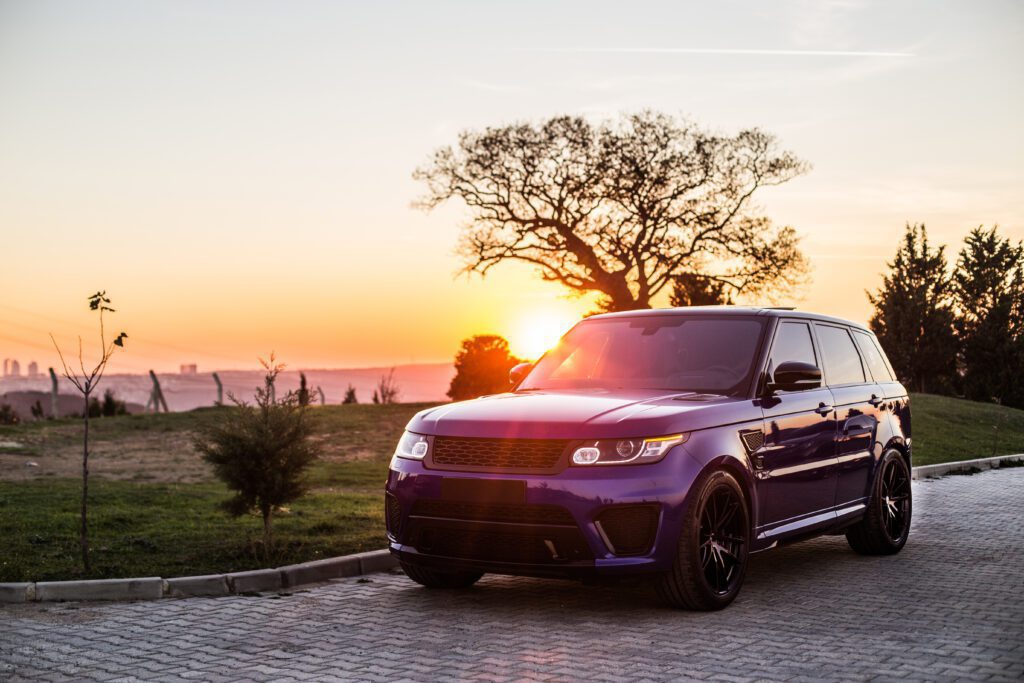 blue jeep photo shooting sunset